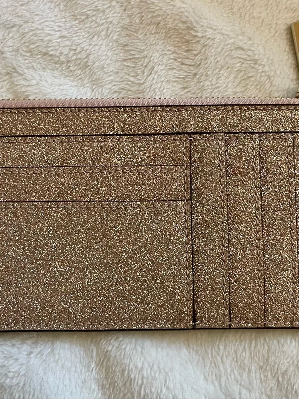 kate spade Rose Gold Glitter Zip Wristlet